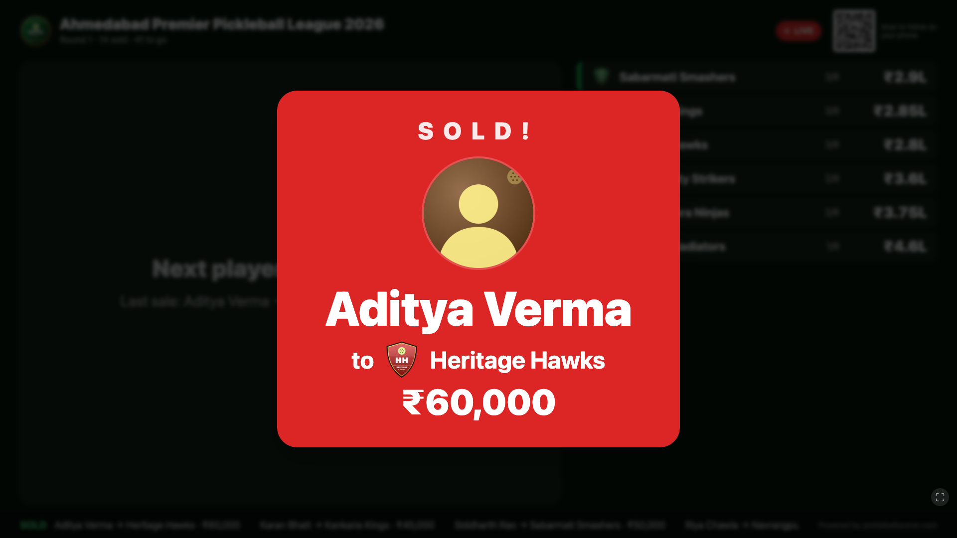 Full-screen SOLD moment on the auction stage screen: the player, the team that bought them and the price